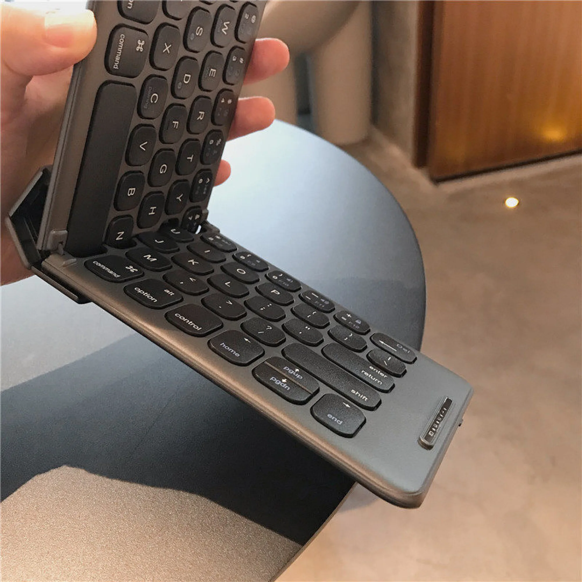 Foldable Bluetooth Keyboard with Two-Fold Design and 65 Keys thumbnail 5