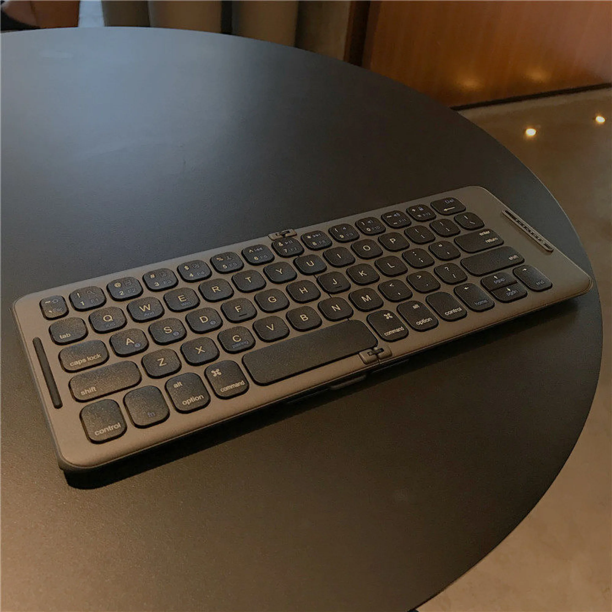 Foldable Bluetooth Keyboard with Two-Fold Design and 65 Keys thumbnail 2