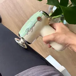 Retro Massage Gun with 3 Interchangeable Heads thumbnail 4